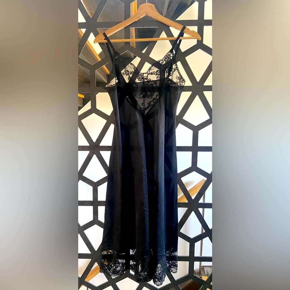 Vintage Emilio Pucci black slip with lace detail.